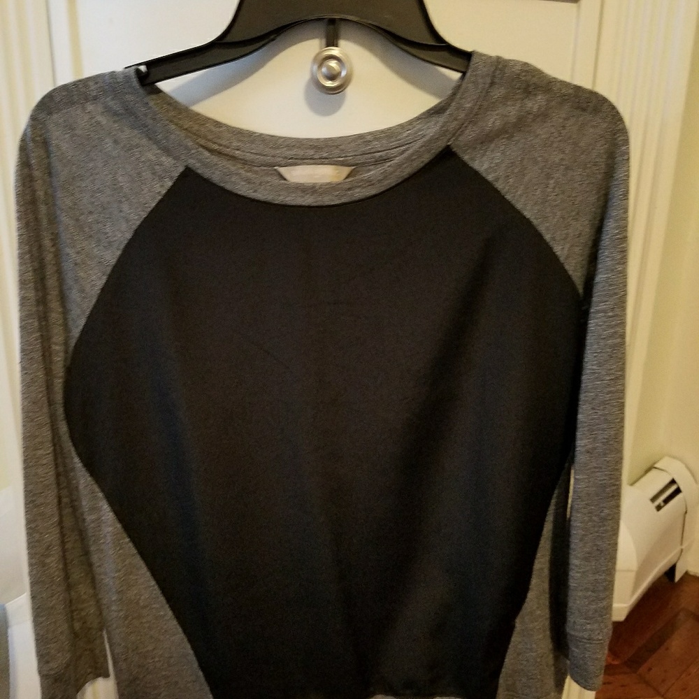 Lightweight gray and black baseball pullover.